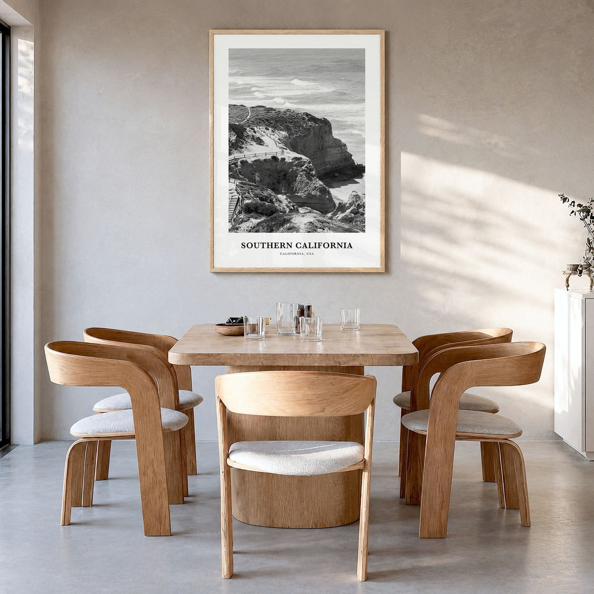 Southern California Classic Poster in a natural wood frame, hanging in a dining room