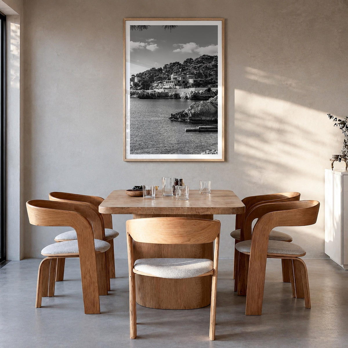 Spain black & white photo poster of Europe – vertical wall art in natural wood frame with white border, hanging on wall