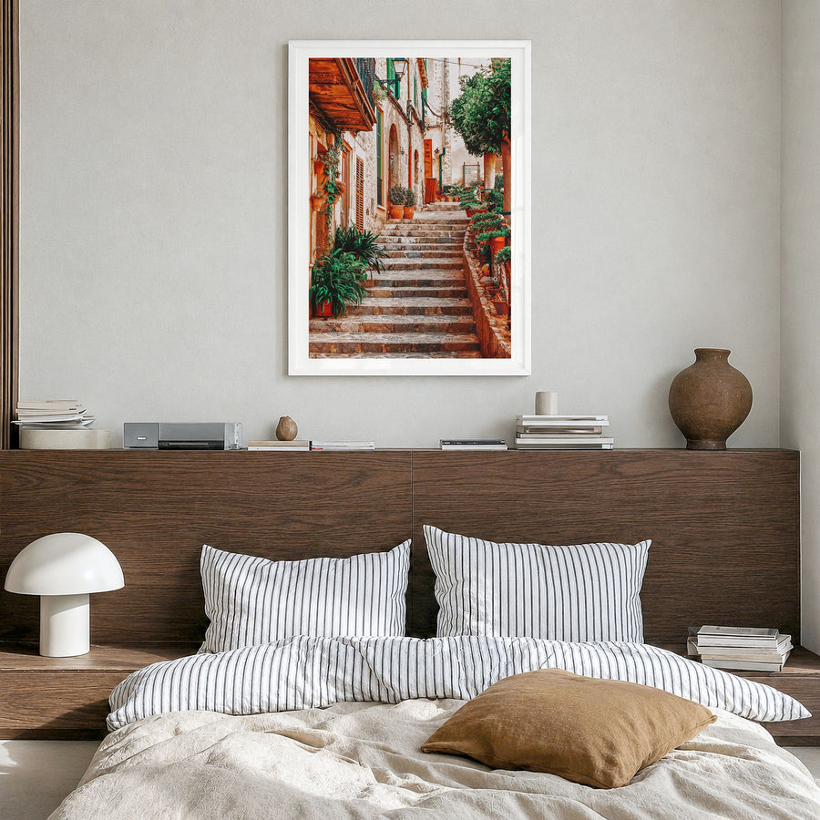 Spain Photo No 2 Poster in a white wood frame, hanging in a bedroom, white border