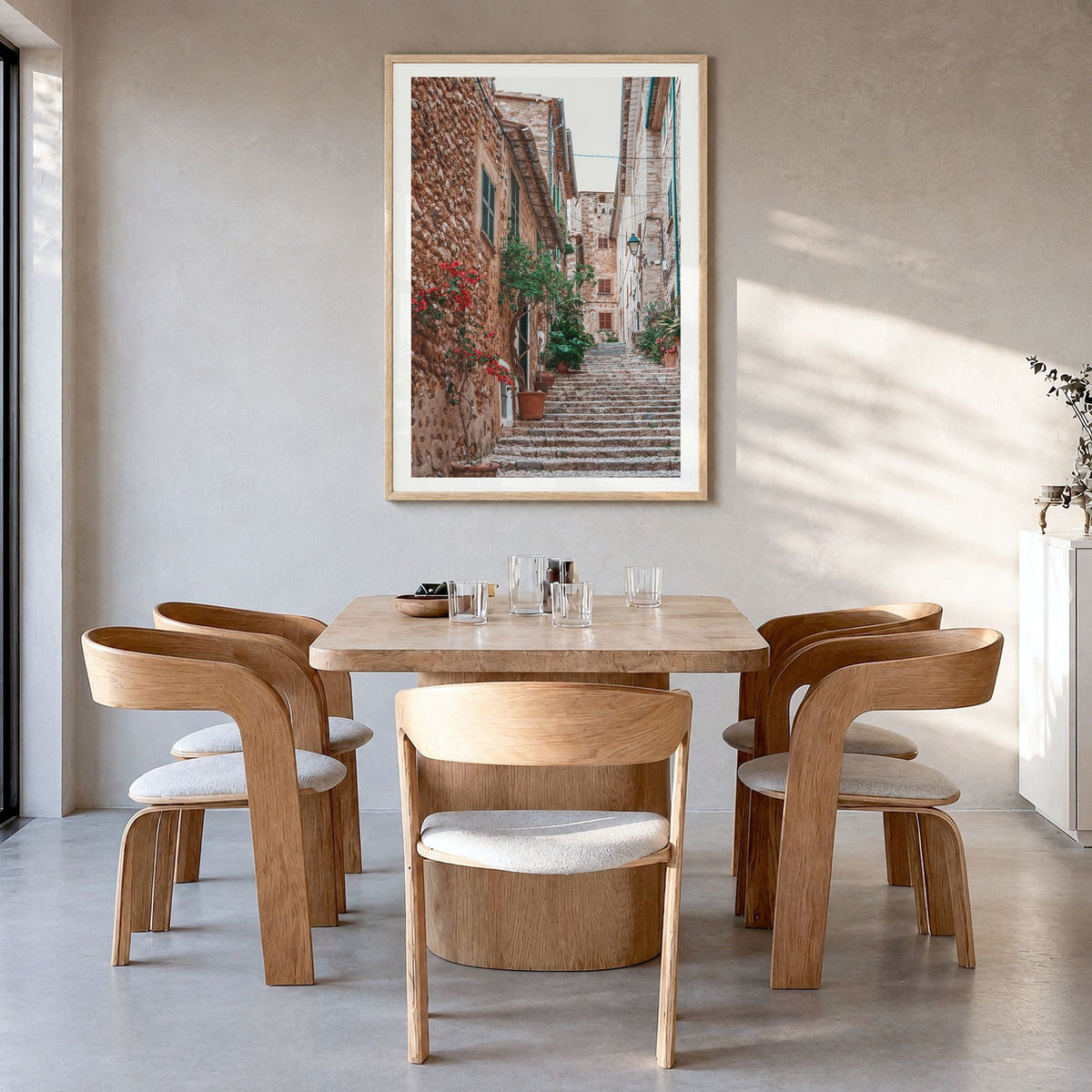 Spain Photo No 3 Poster in a natural wood frame, hanging in a dining room, white border