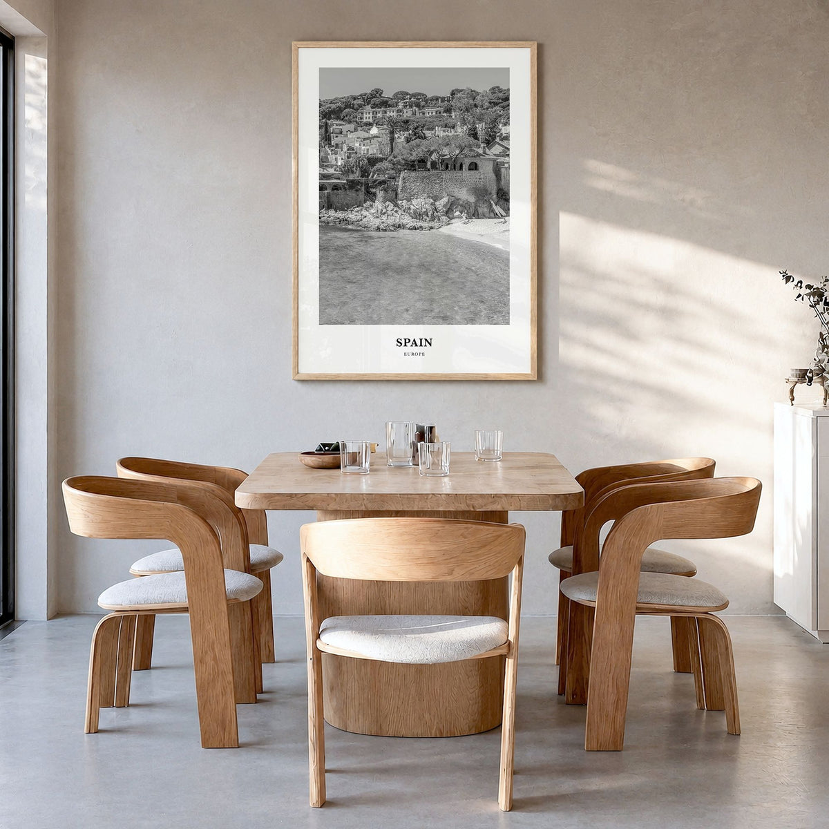 Spain Classic No 2 Poster in a natural wood frame, hanging in a dining room