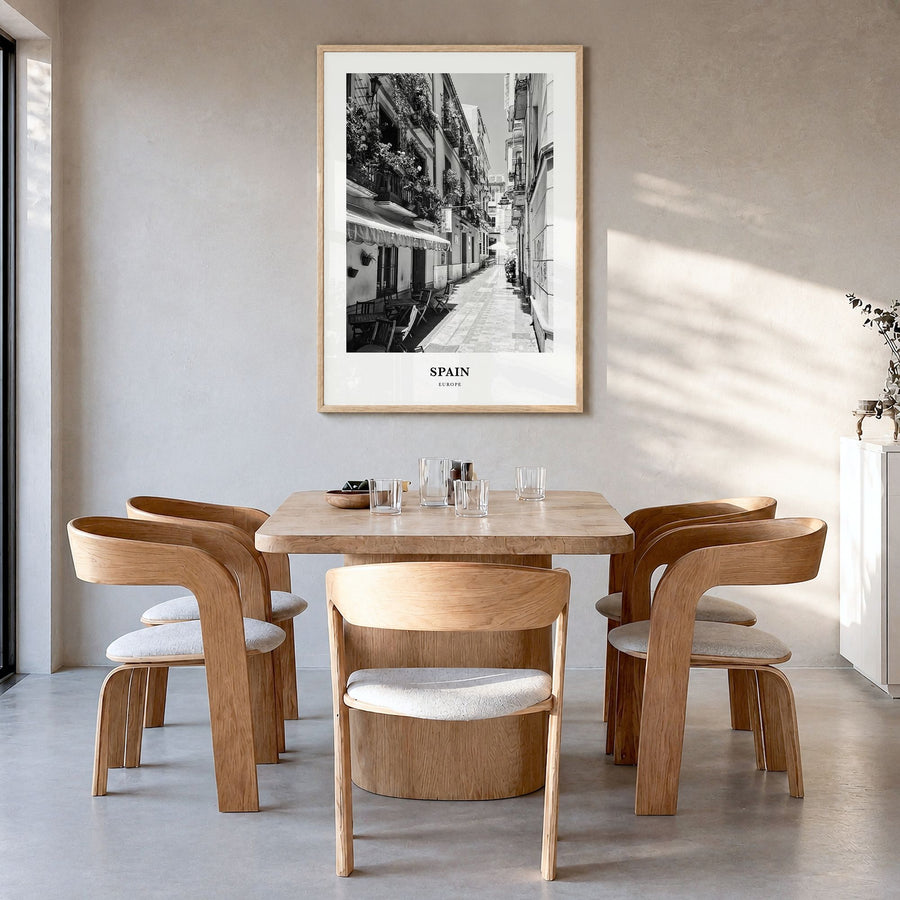 Spain Classic No 3 Poster in a natural wood frame, hanging in a dining room