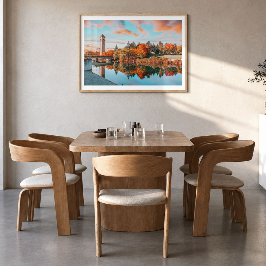 Spokane Photo Poster in a natural wood frame, hanging in a dining room, white border