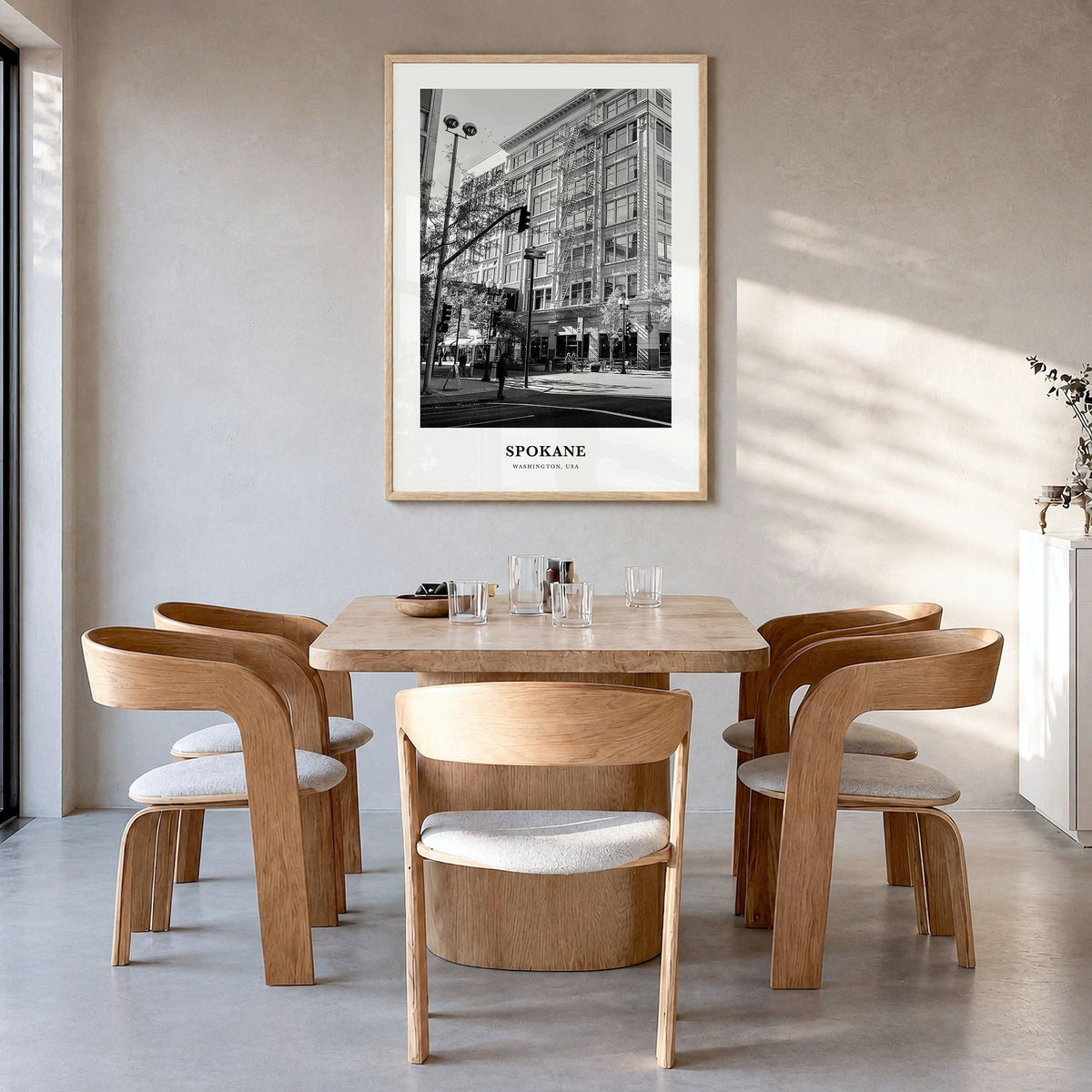 Spokane Classic No 1 Poster in a natural wood frame, hanging in a dining room