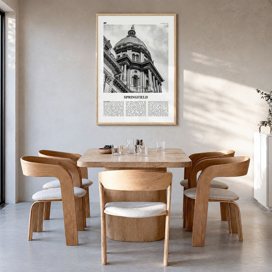 Springfield, Illinois Newspaper Poster in a natural wood frame, hanging in a dining room