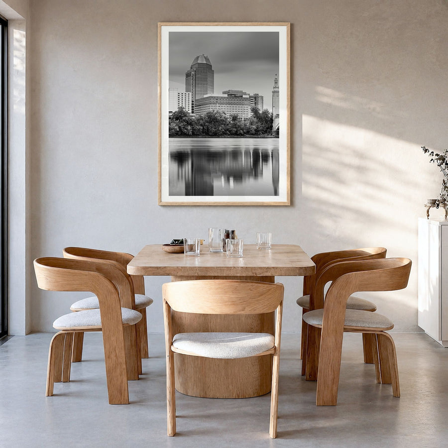 Springfield, Massachusetts Photo Poster in a natural wood frame, hanging in a dining room, white border