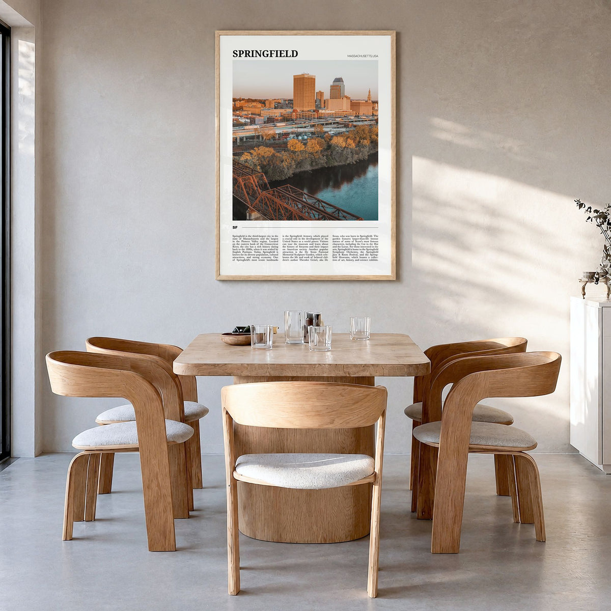 Springfield, Massachusetts Travel Poster in a natural wood frame, hanging in a dining room