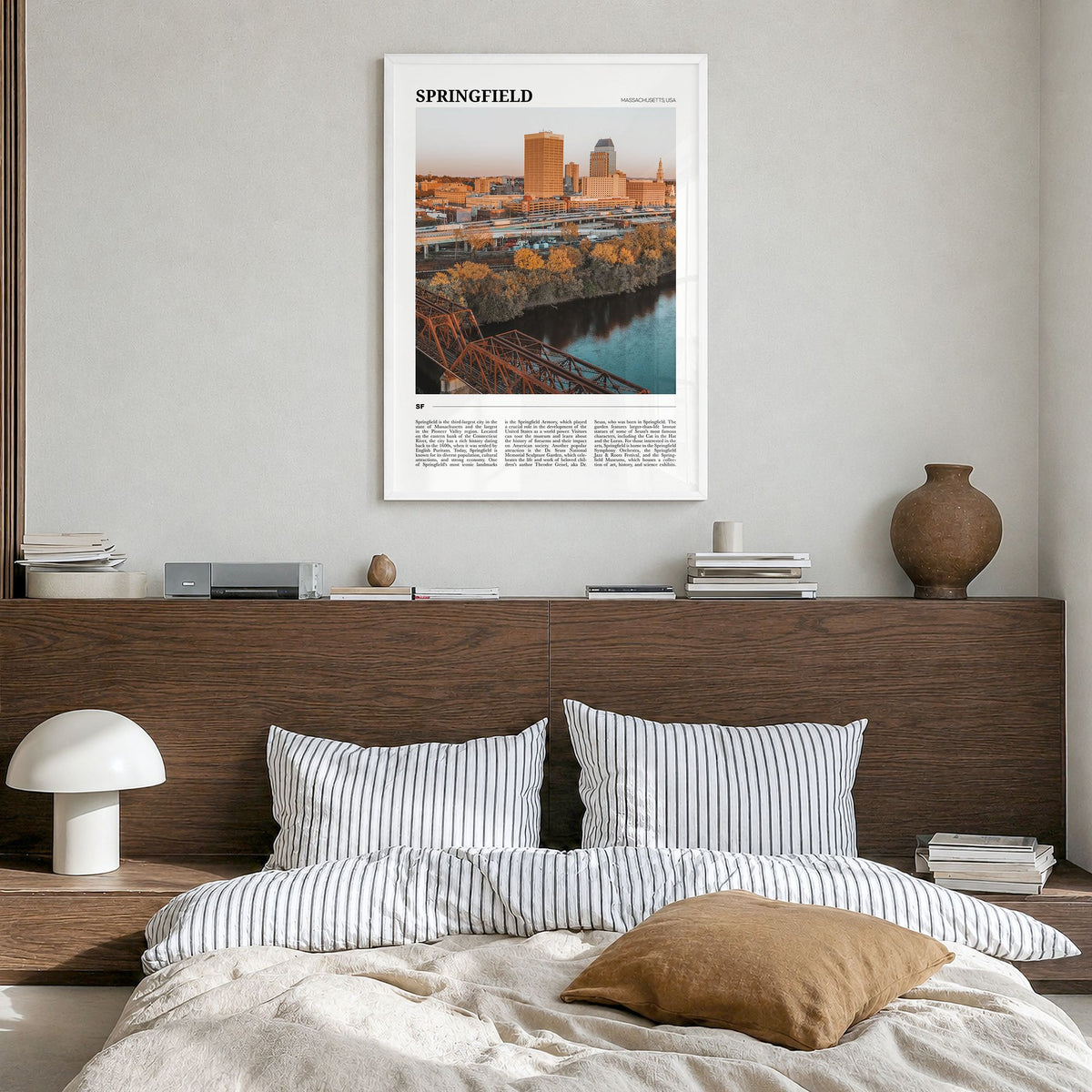 Springfield, Massachusetts Travel Poster in a white wood frame, hanging in a bedroom