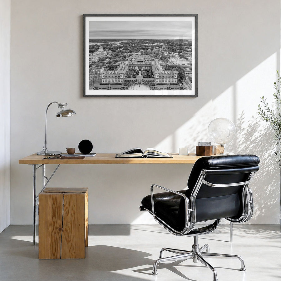 St. Augustine Photo Poster in a black wood frame, hanging in a bright home office, white border