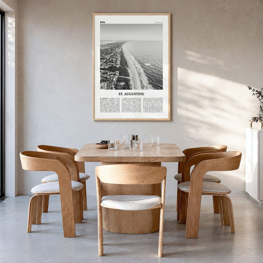 St. Augustine Newspaper No 2 Poster in a natural wood frame, hanging in a dining room
