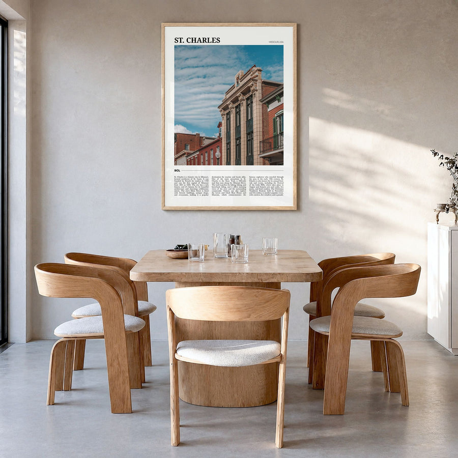 St. Charles, Missouri Travel Poster in a natural wood frame, hanging in a dining room