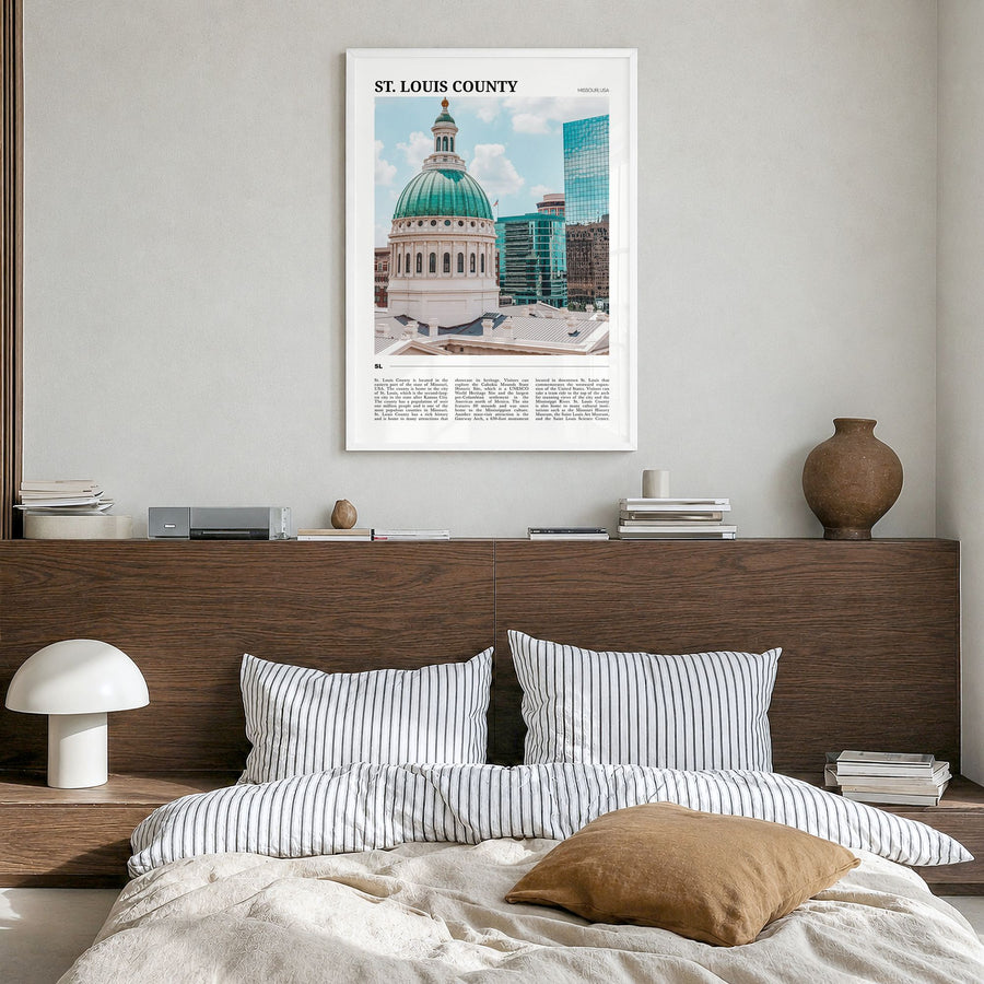 St. Louis County Travel Poster in a white wood frame, hanging in a bedroom