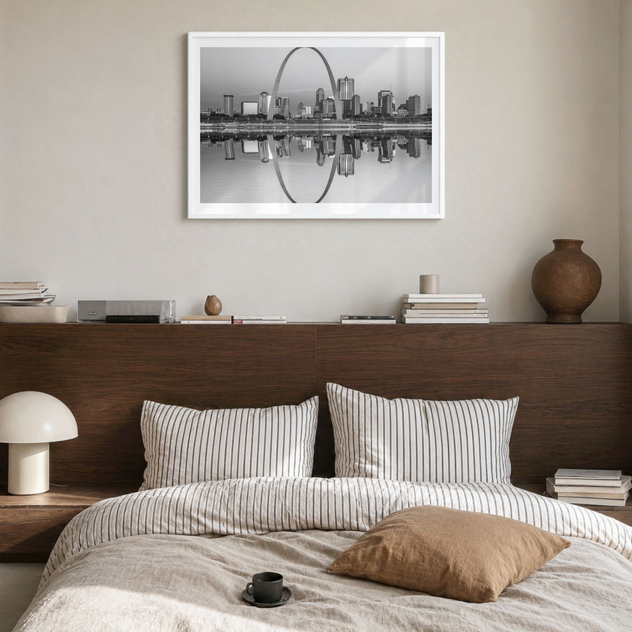St. Louis Photo Poster in a white wood frame, hanging in a bedroom, white border