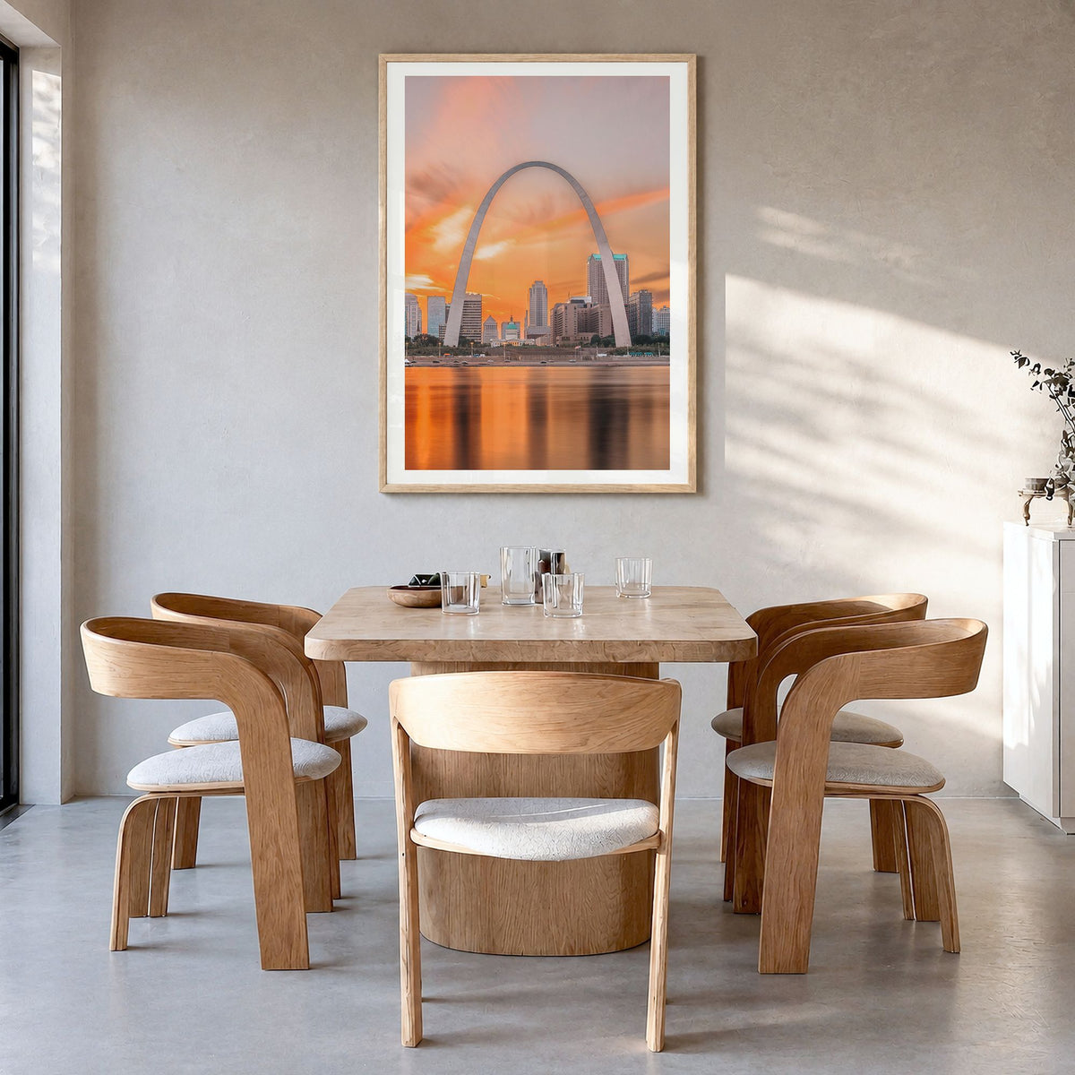 St. Louis Photo No 1 Poster in a natural wood frame, hanging in a dining room, white border