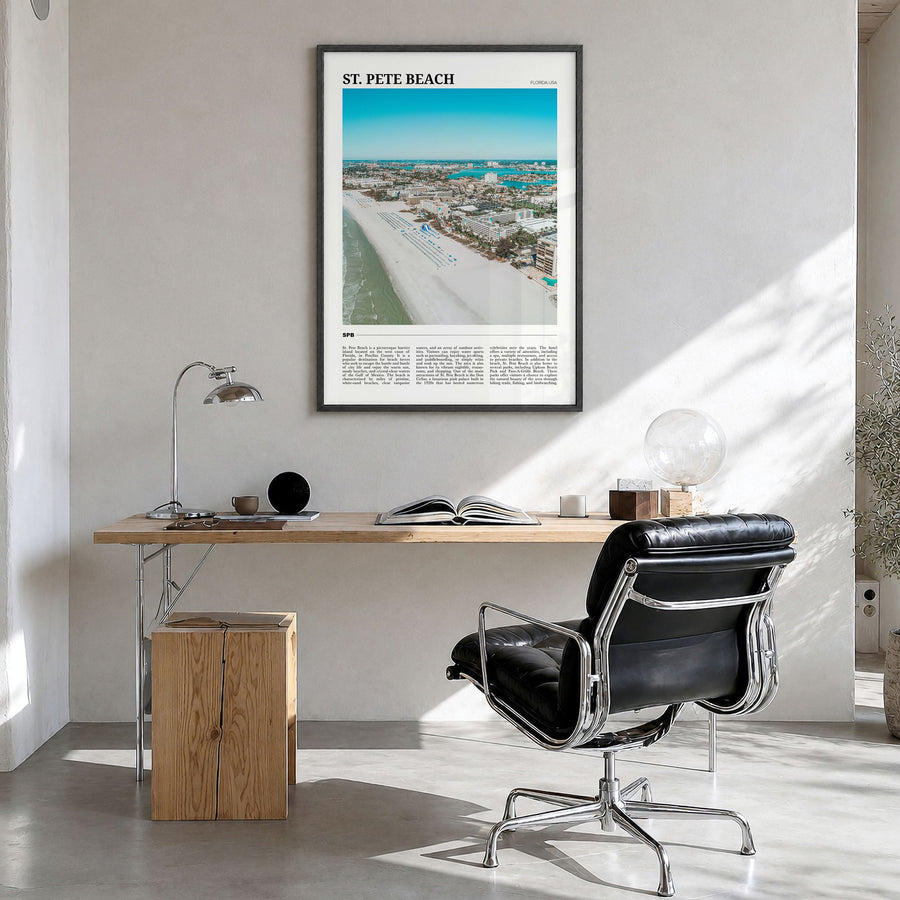 St. Pete Beach Travel Poster in a black wood frame, hanging in a bright home office