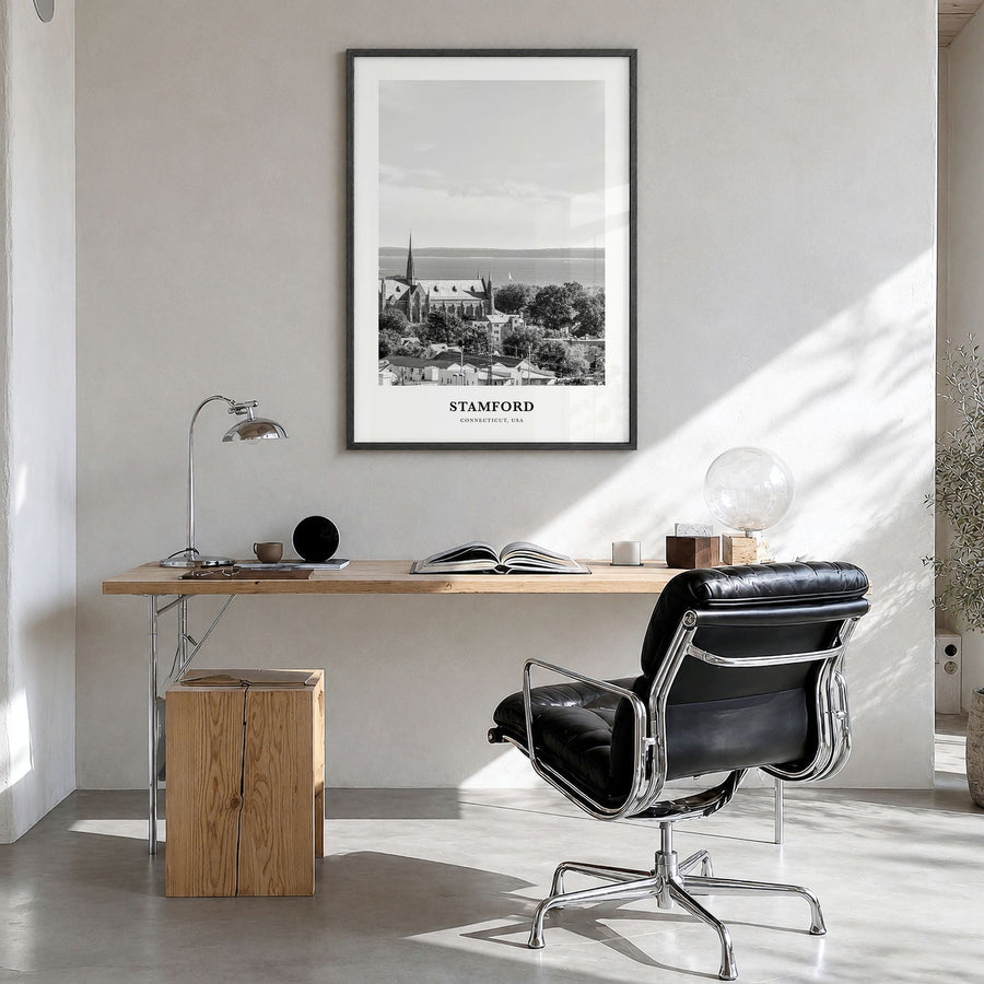 Stamford, Connecticut Classic Poster in a black wood frame, hanging in a bright home office