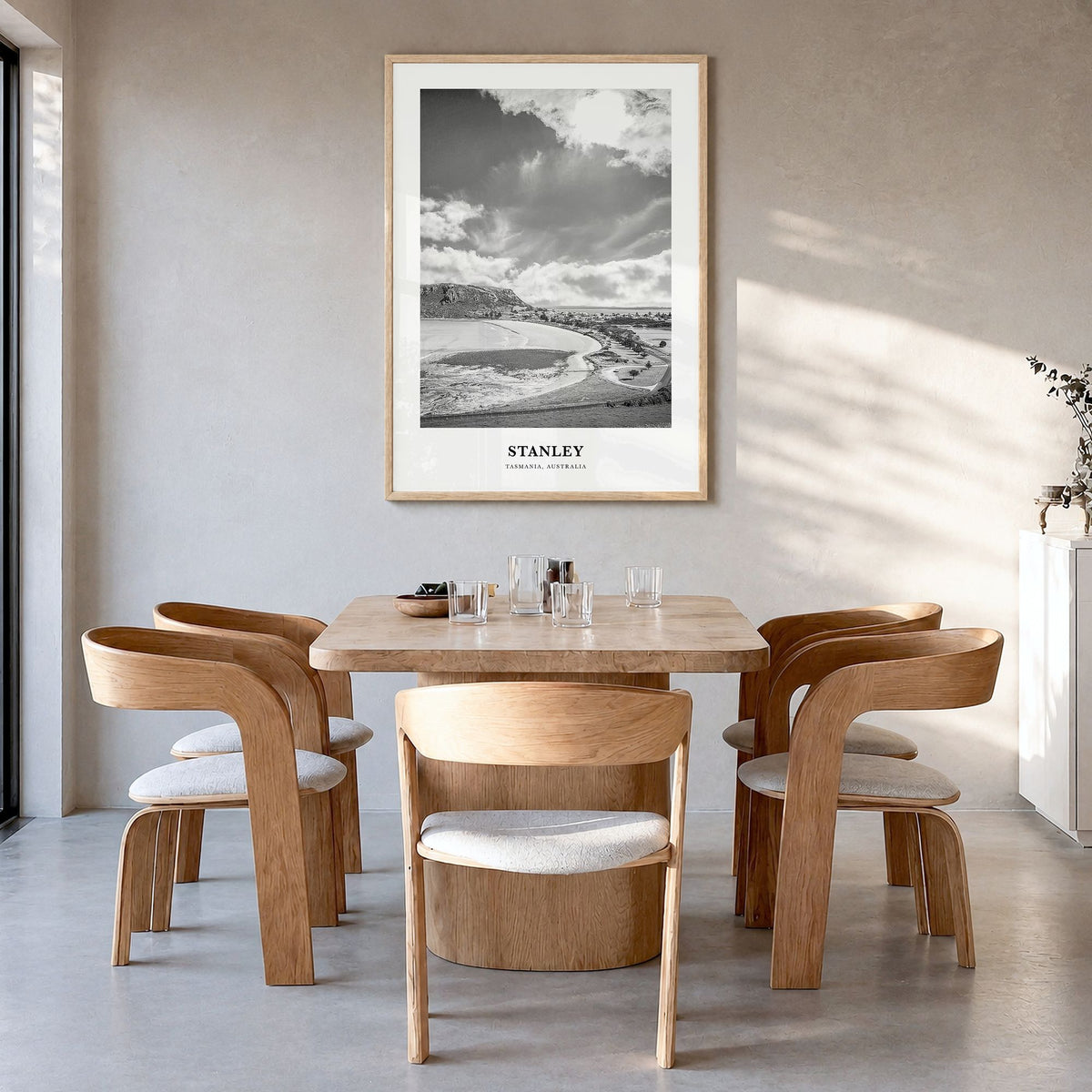 Stanley Classic Poster in a natural wood frame, hanging in a dining room