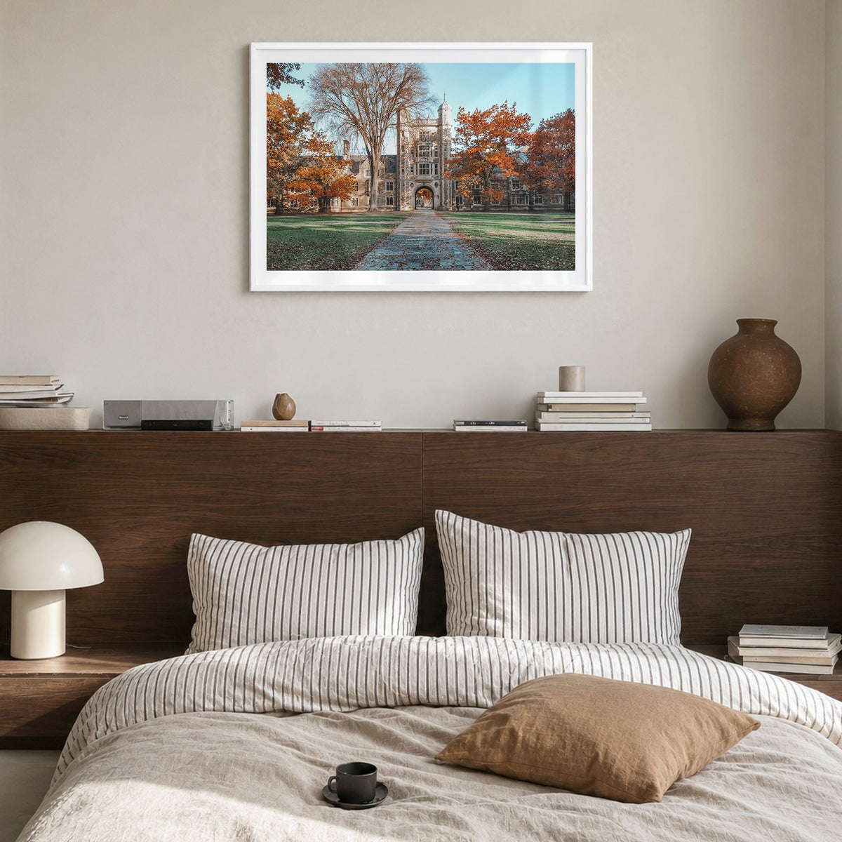 State College Photo Poster in a white wood frame, hanging in a bedroom, white border