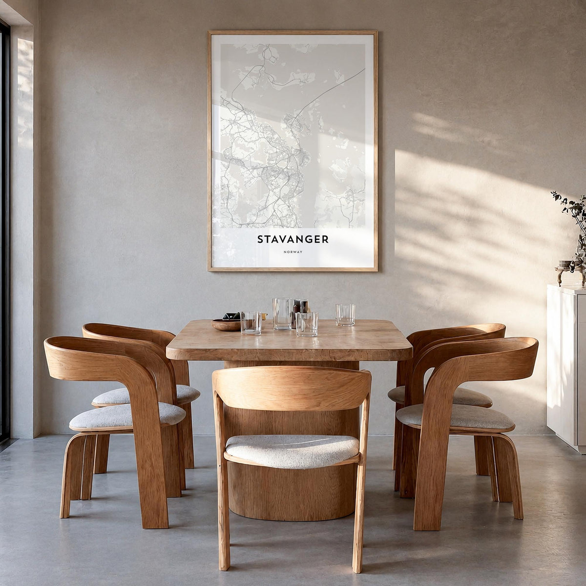 Stavanger black & white map poster of Norway – vertical wall art in natural wood frame, hanging on wall
