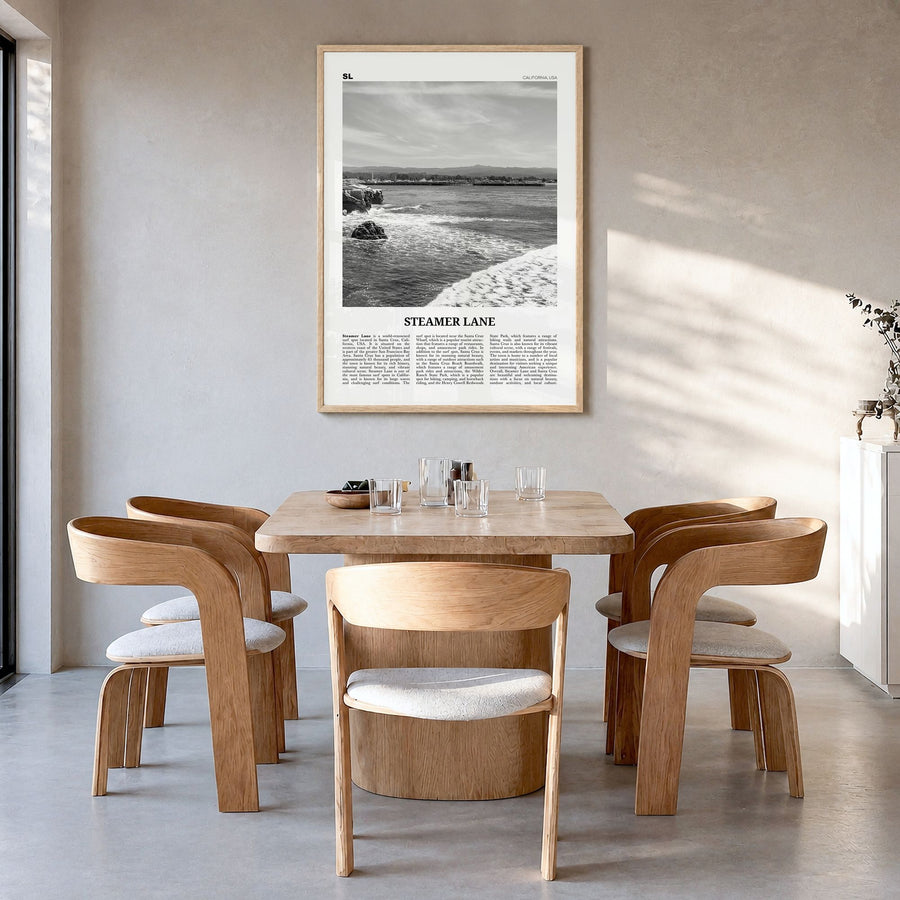 Steamer Lane Newspaper Poster in a natural wood frame, hanging in a dining room