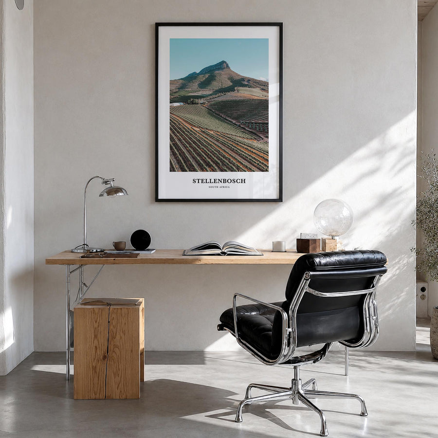 Stellenbosch colorful classic poster of South Africa – vertical wall art in black wood frame, hanging on wall