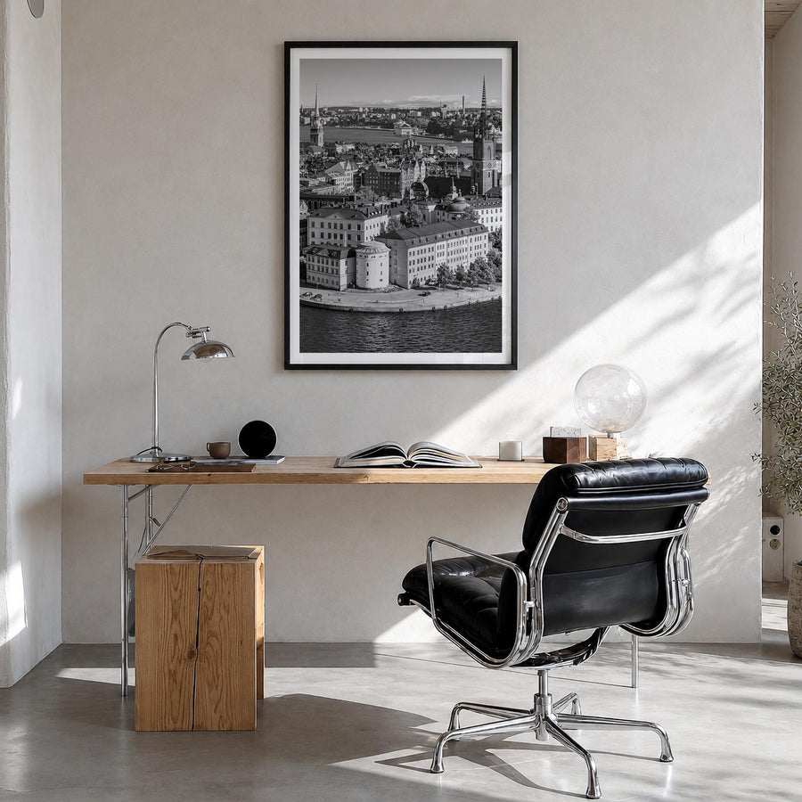 Stockholm black & white photo poster of Sweden – vertical wall art in black wood frame with white border, hanging on wall