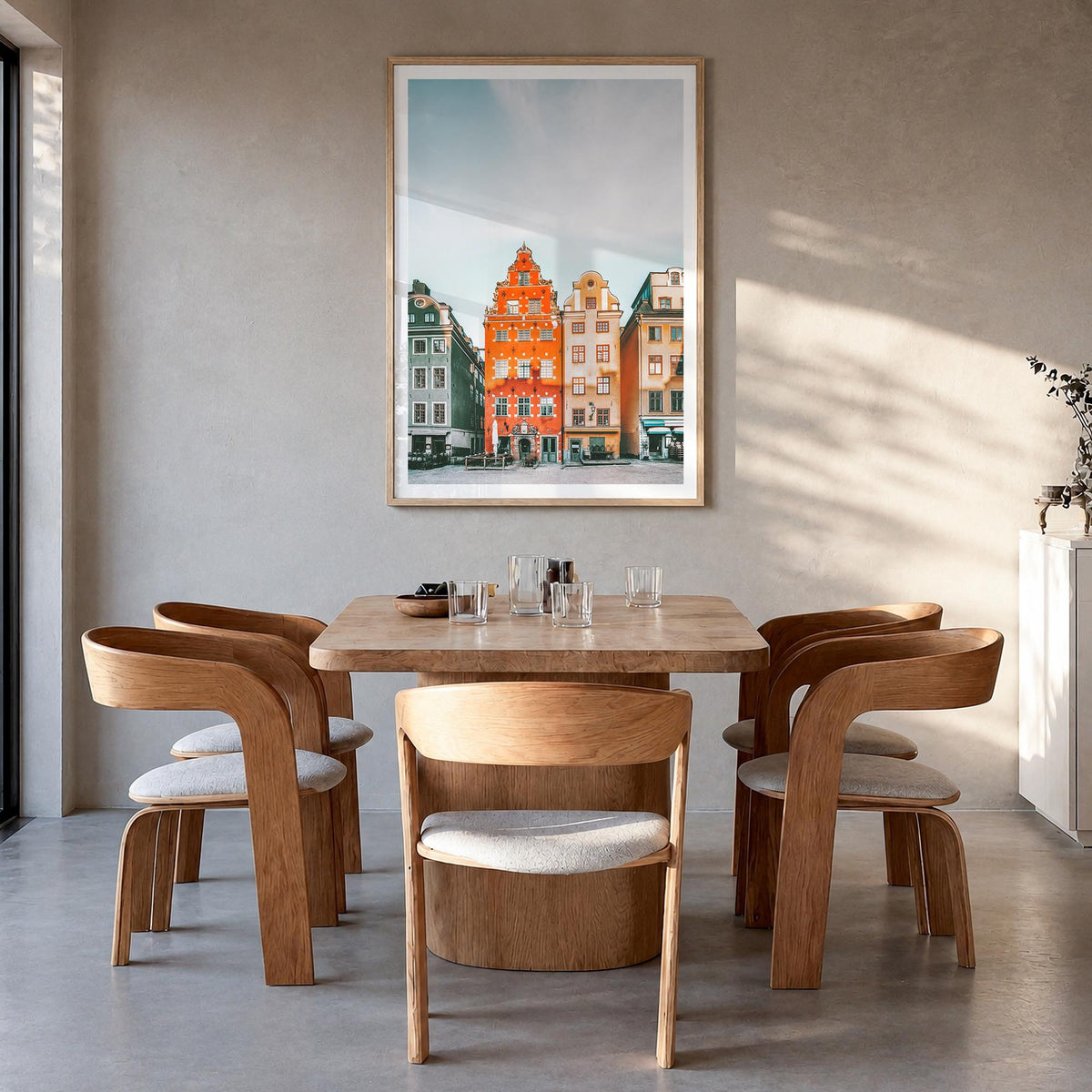 Stockholm no. 3 colorful photo poster of Sweden – vertical wall art in natural wood frame with white border, hanging on wall