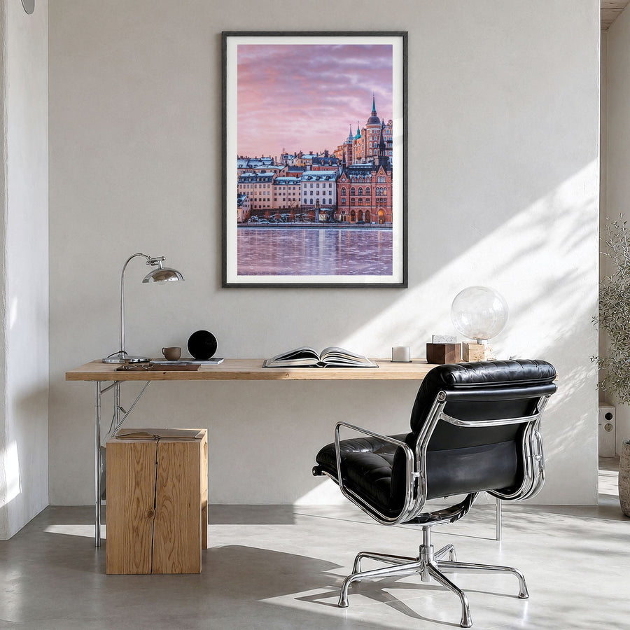 Stockholm Photo No 2 Poster in a black wood frame, hanging in a bright home office, white border