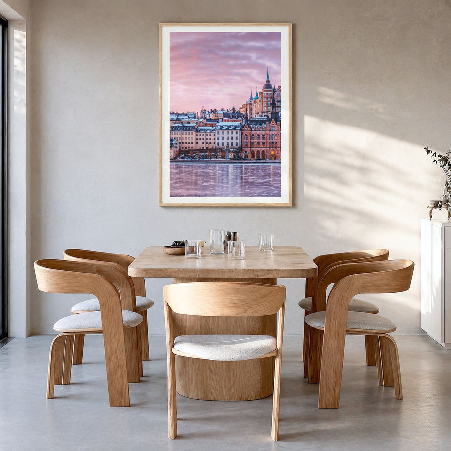 Stockholm Photo No 2 Poster in a natural wood frame, hanging in a dining room, white border