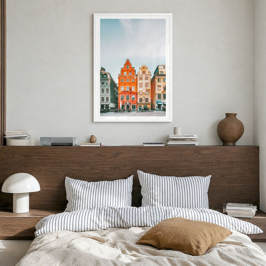 Stockholm Photo No 3 Poster in a white wood frame, hanging in a bedroom, white border