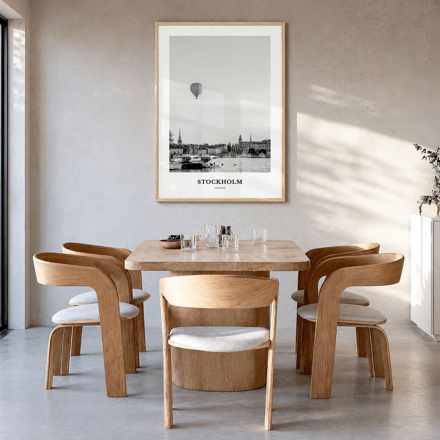 Stockholm Classic No 1 Poster in a natural wood frame, hanging in a dining room