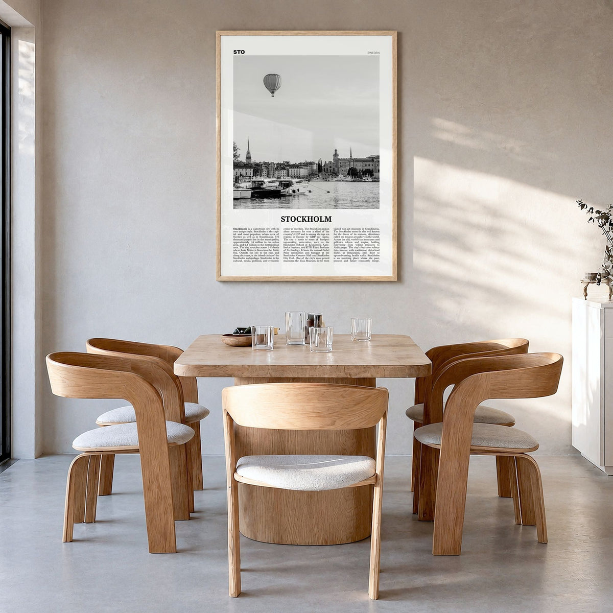 Stockholm Newspaper No 2 Poster in a natural wood frame, hanging in a dining room
