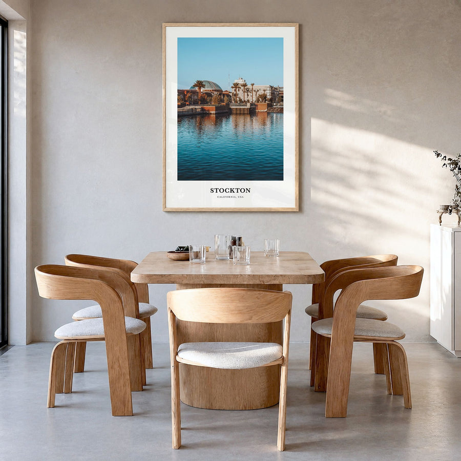 Stockton Classic Poster in a natural wood frame, hanging in a dining room
