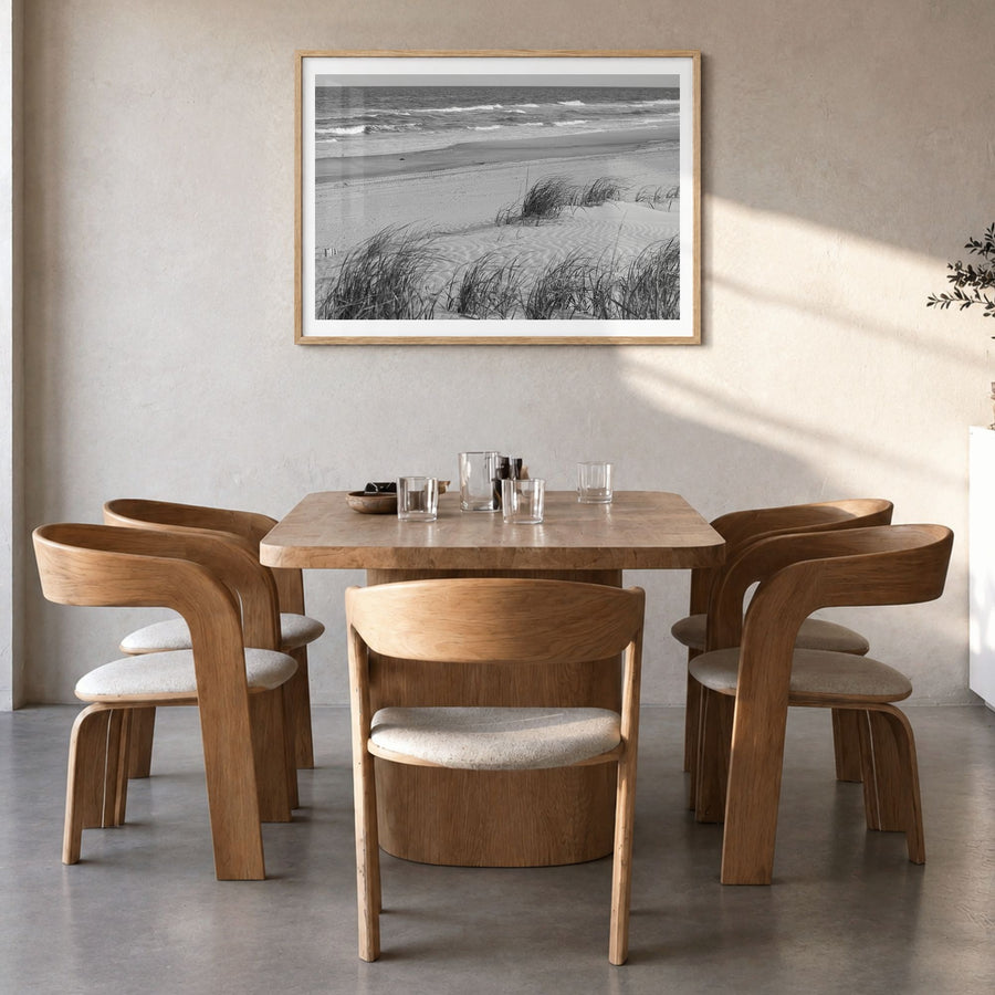 Stone Harbor Photo Poster in a natural wood frame, hanging in a dining room, white border