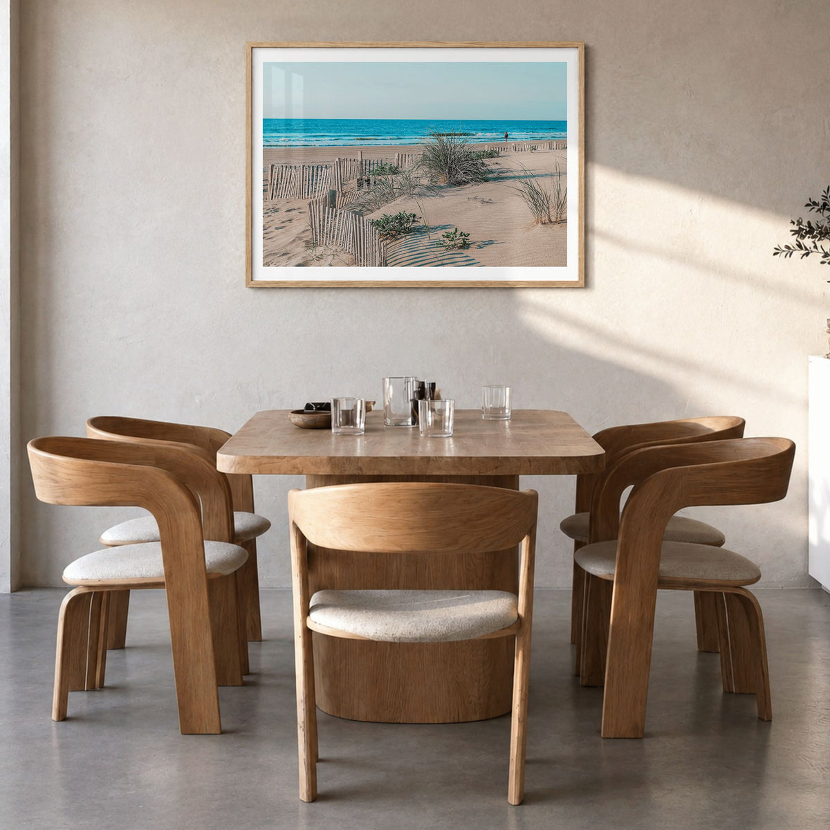 Stone Harbor Photo Poster in a natural wood frame, hanging in a dining room, white border