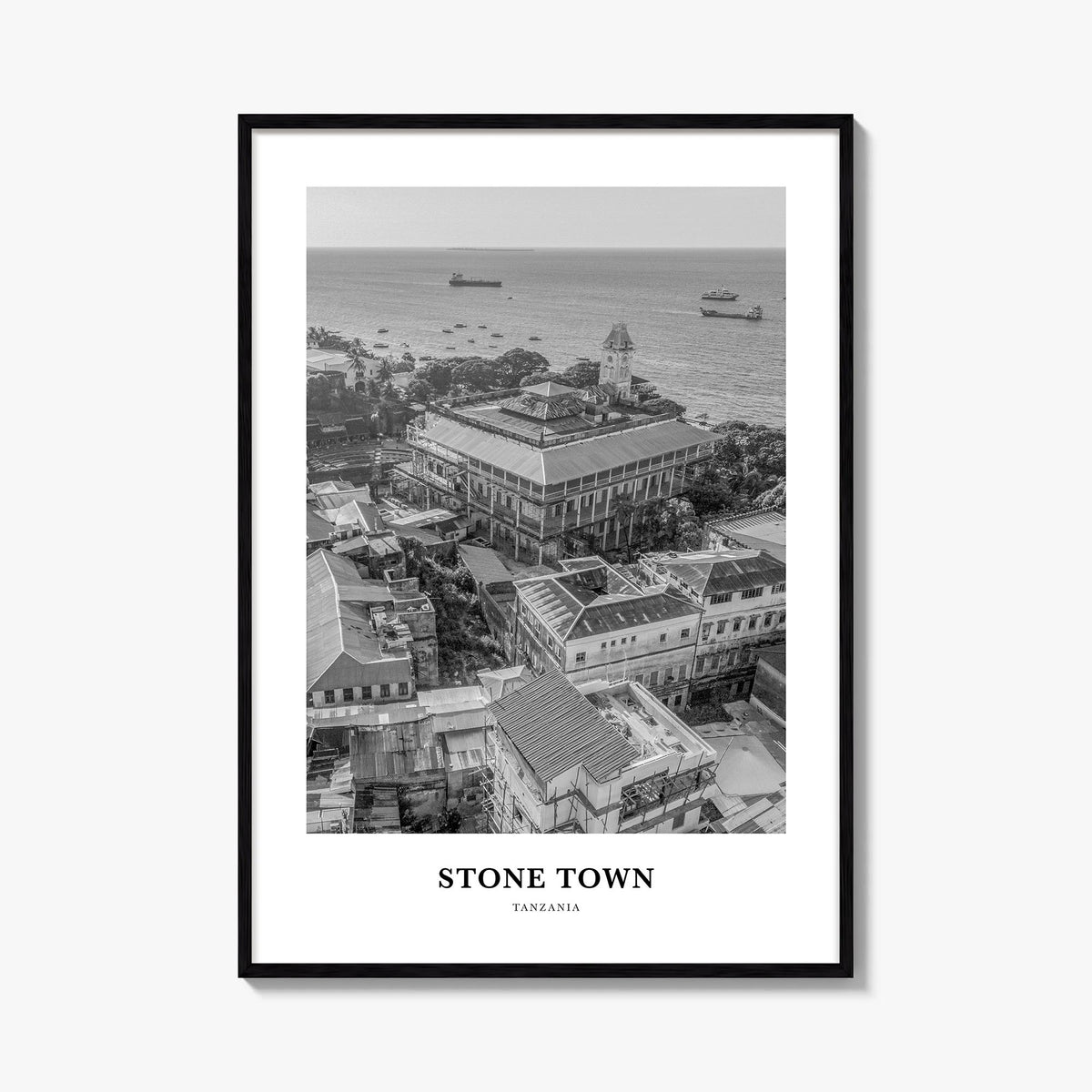 Stone Town black & white classic poster of Tanzania – vertical wall art, unframed print shown in interior mockup
