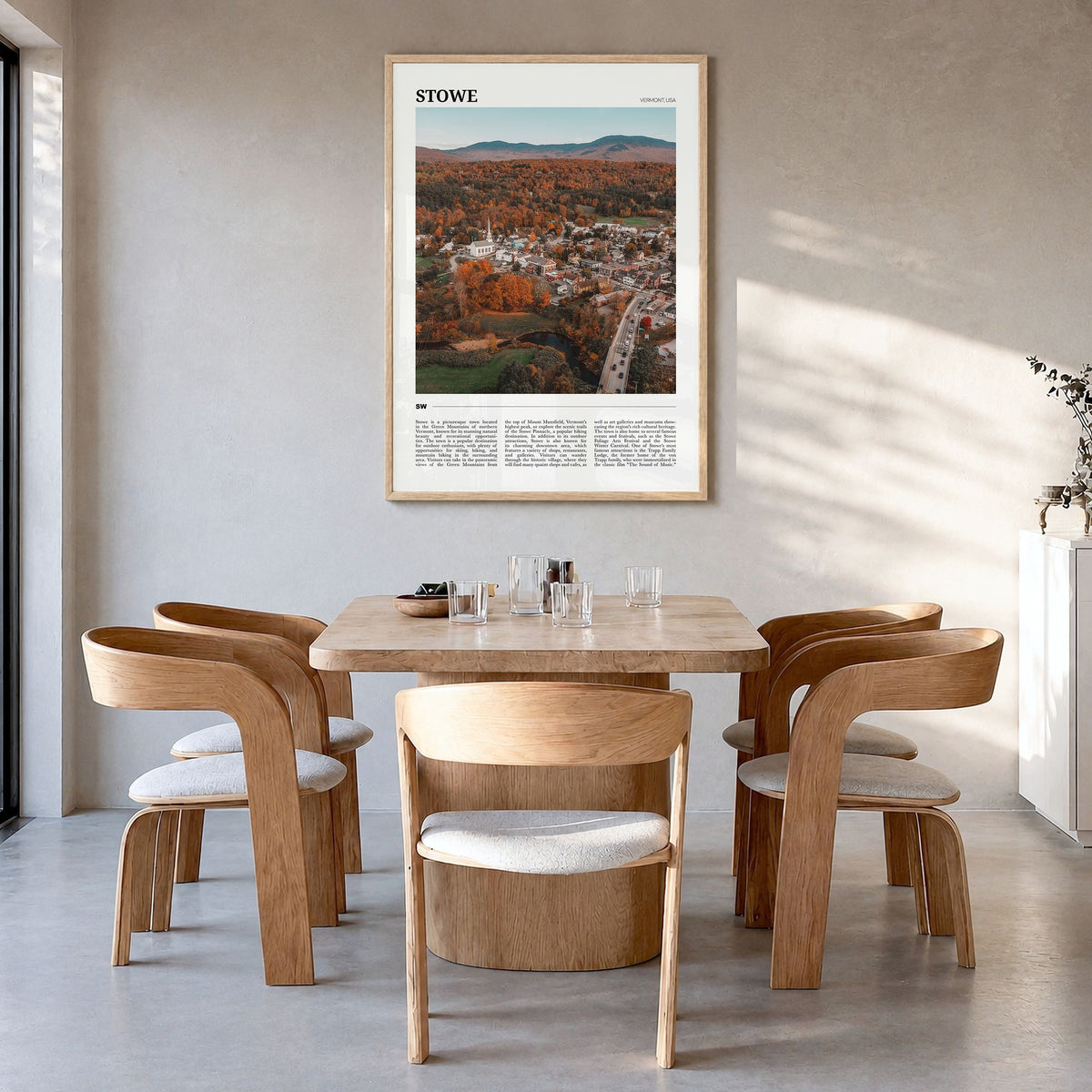 Stowe Travel No 1 Poster in a natural wood frame, hanging in a dining room