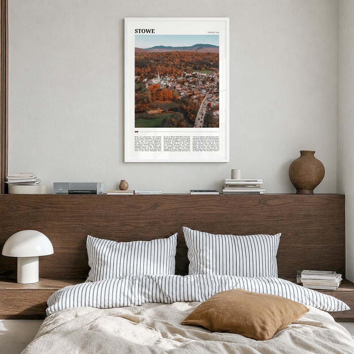Stowe Travel No 1 Poster in a white wood frame, hanging in a bedroom