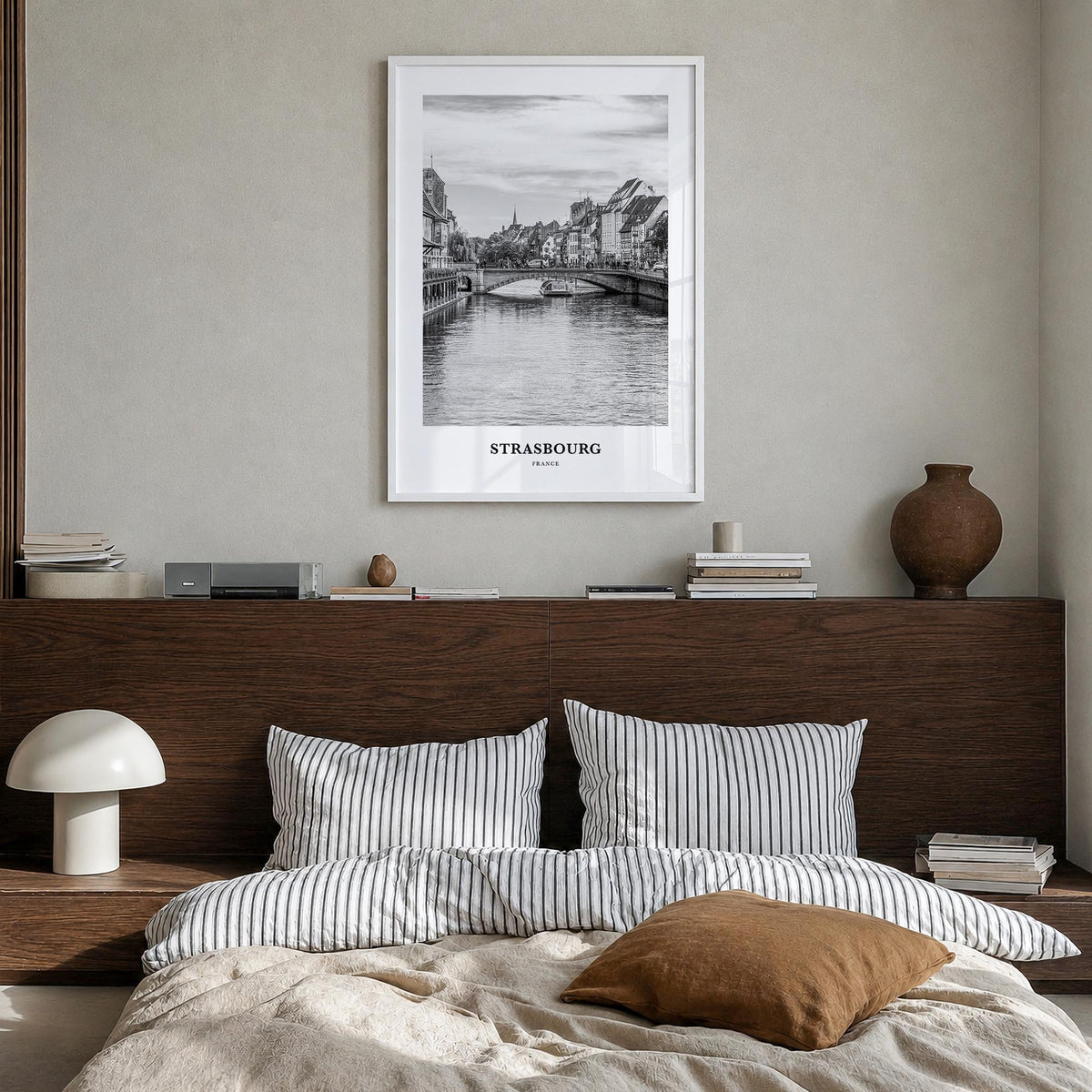 Strasbourg black & white classic poster of France – vertical wall art in white wood frame, hanging on wall