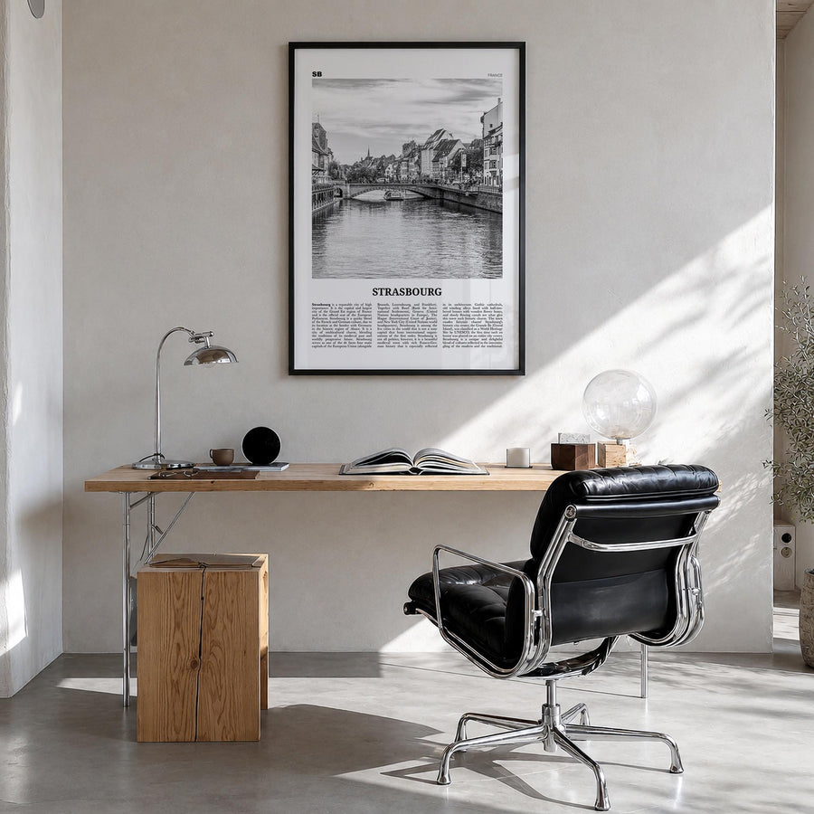 Strasbourg black & white newspaper poster of France – vertical wall art in black wood frame, hanging on wall