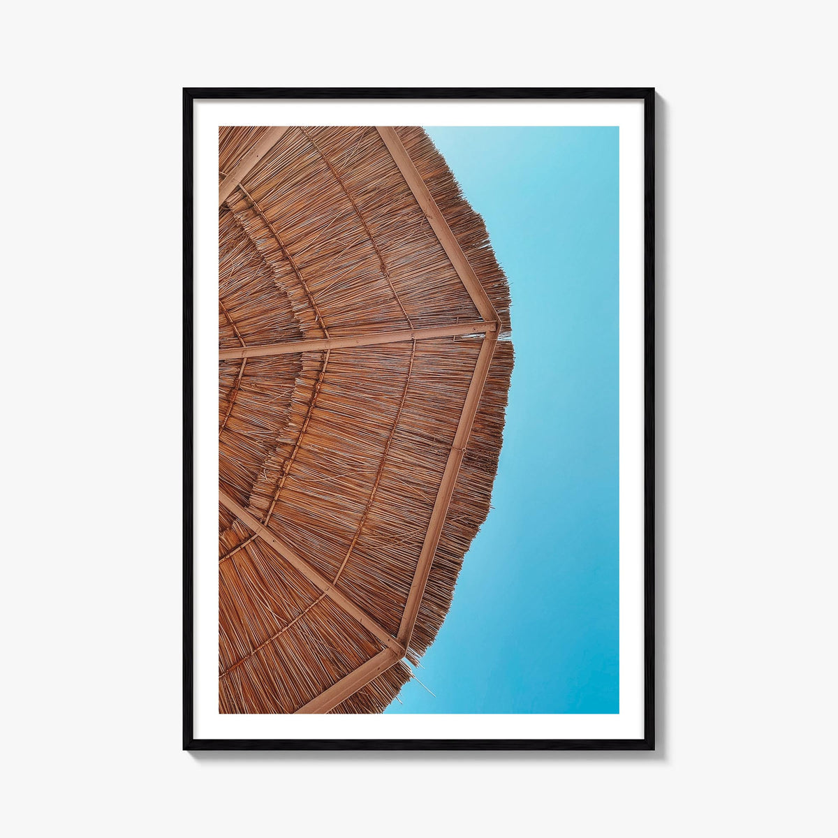 Straw Umbrella colorful photo poster – vertical wall art, unframed print shown in interior mockup