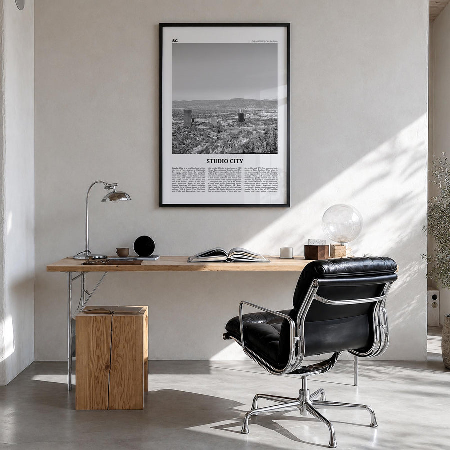 Studio City black & white newspaper poster of Los Angeles, California – vertical wall art in black wood frame, hanging on wal