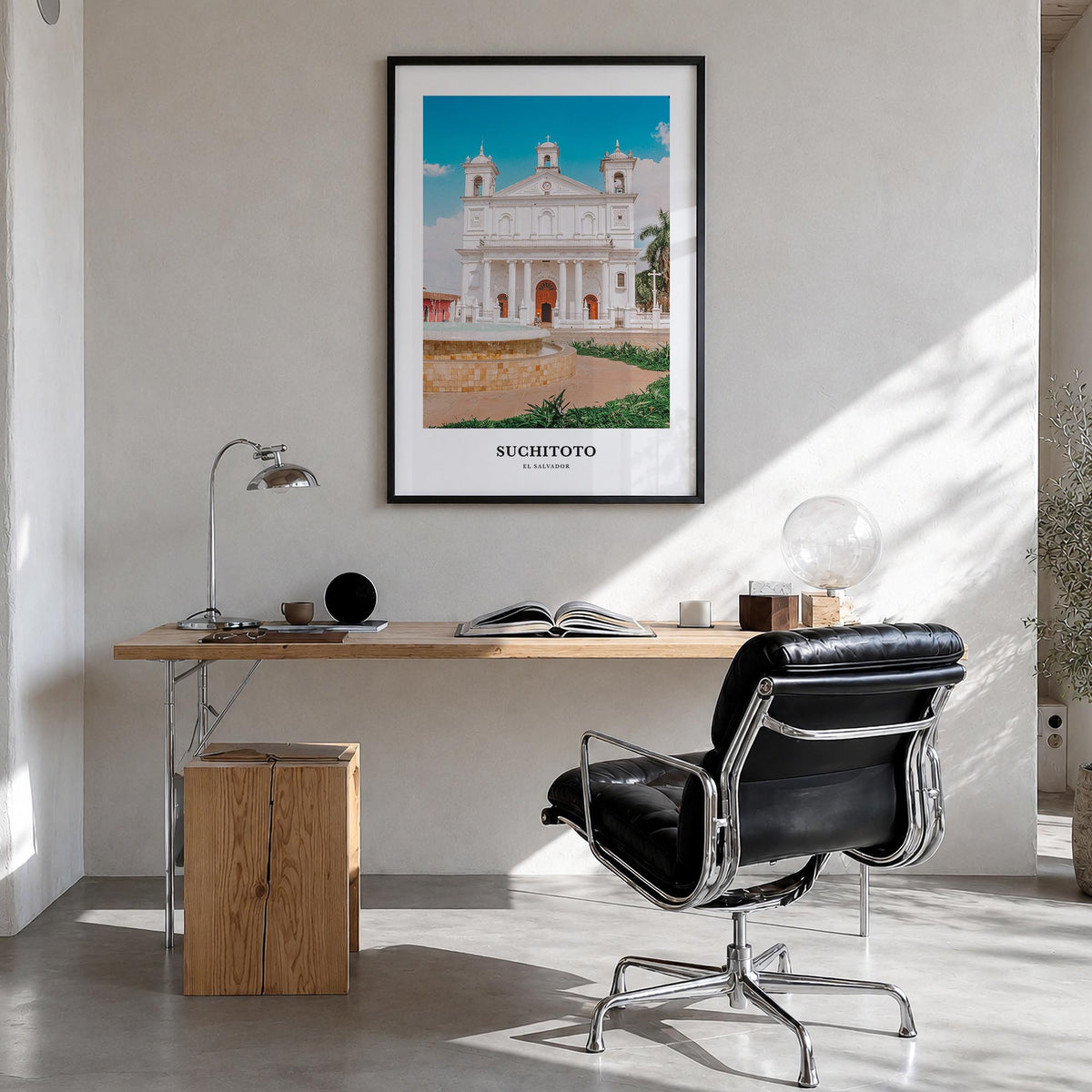 Suchitoto colorful classic poster of El Salvador – vertical wall art in black wood frame, hanging on wall