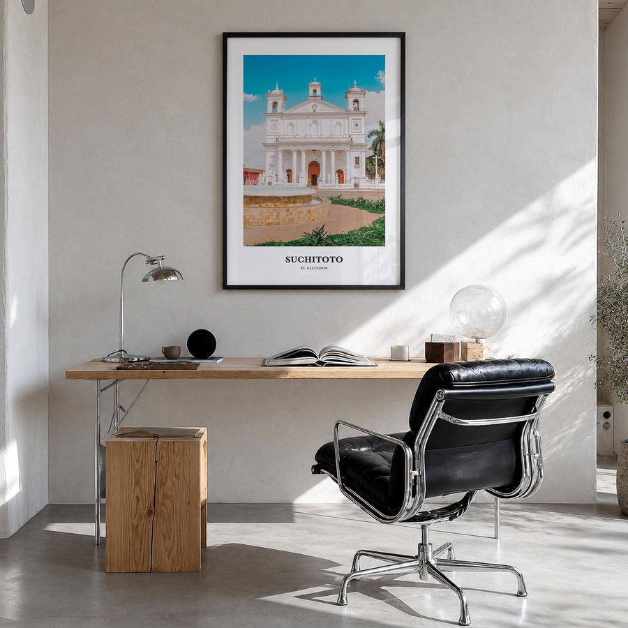 Suchitoto colorful classic poster of El Salvador – vertical wall art in black wood frame, hanging on wall