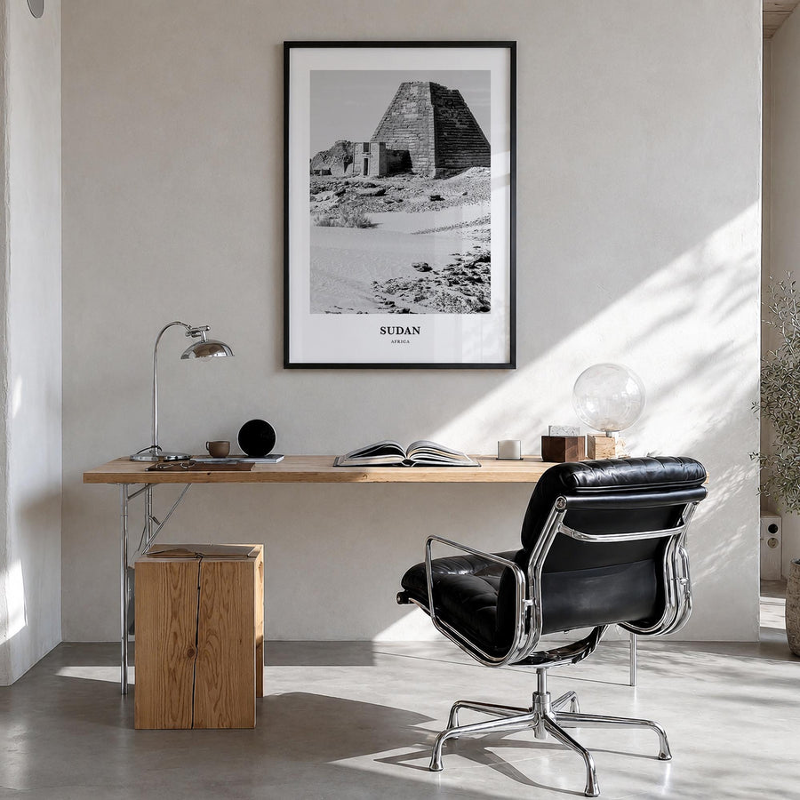 Sudan black & white classic poster of Africa – vertical wall art in black wood frame, hanging on wall