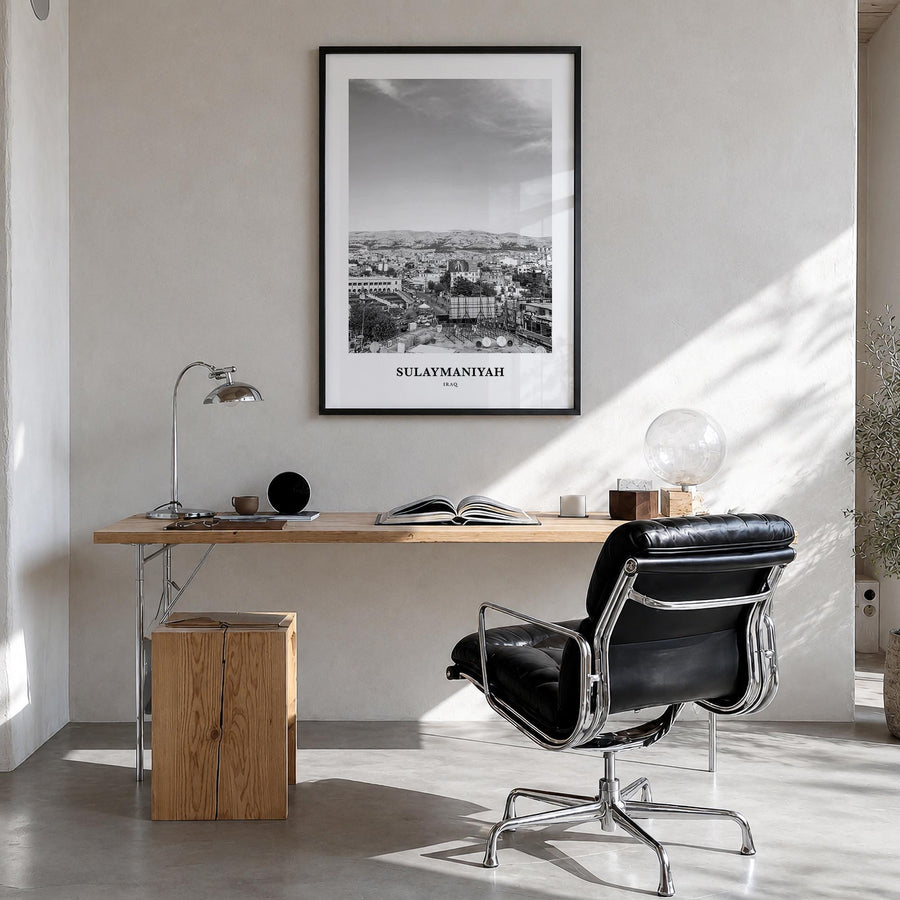 Sulaymaniyah black & white classic poster of Iraq – vertical wall art in black wood frame, hanging on wall
