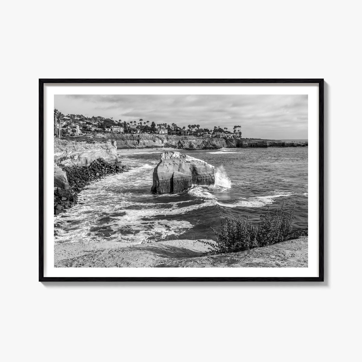 Sunset Cliffs black & white photo poster of San Diego, California – horizontal wall art, unframed print shown in interior moc