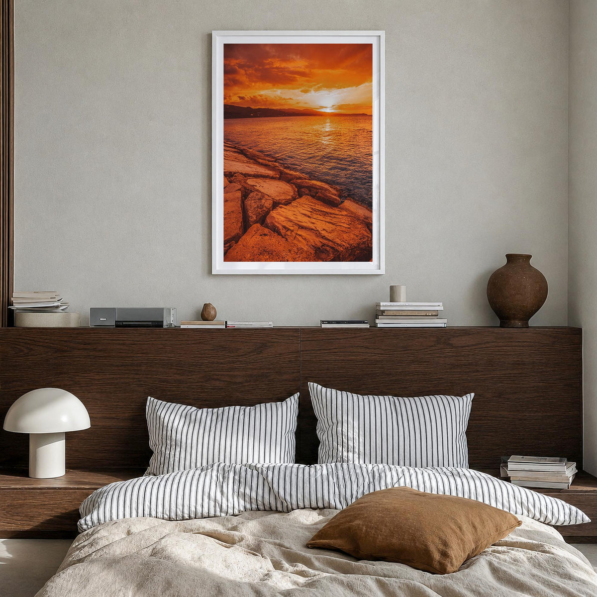 Sunset Coast colorful photo poster – vertical wall art in white wood frame with white border, hanging on wall