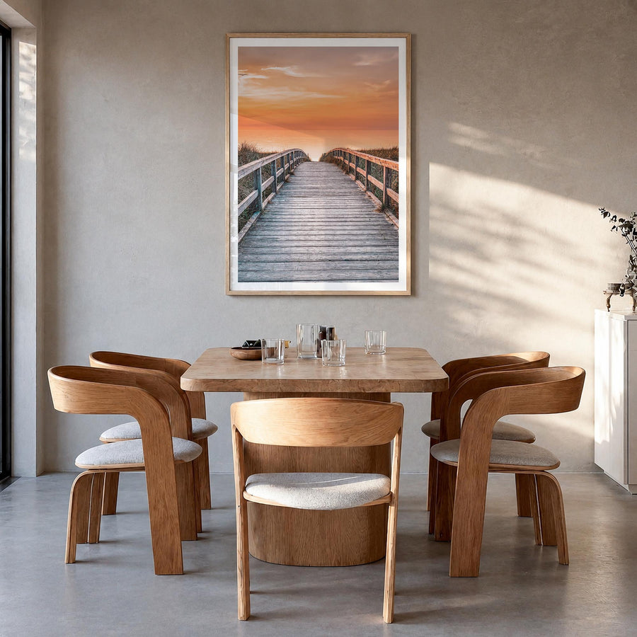 Sunset Road to the Beach colorful photo poster – vertical wall art in natural wood frame with white border, hanging on wall