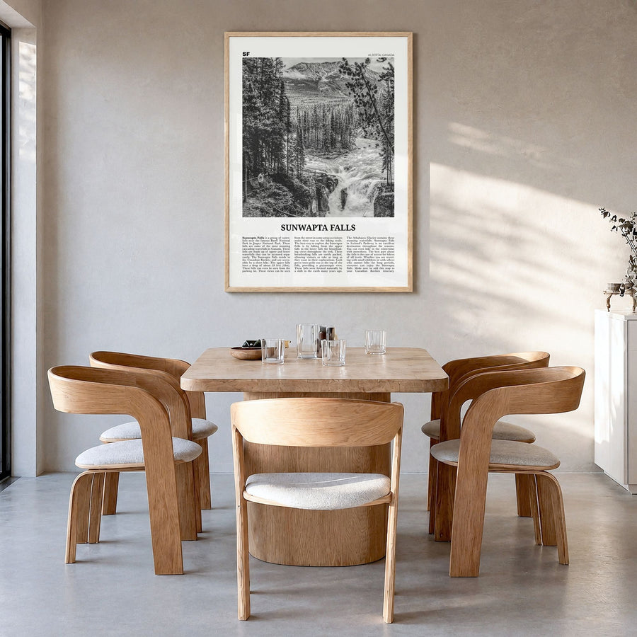Sunwapta Falls Newspaper Poster in a natural wood frame, hanging in a dining room